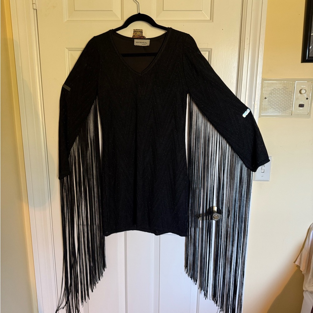 Black minidress with long fringe 
Size medium by Michela